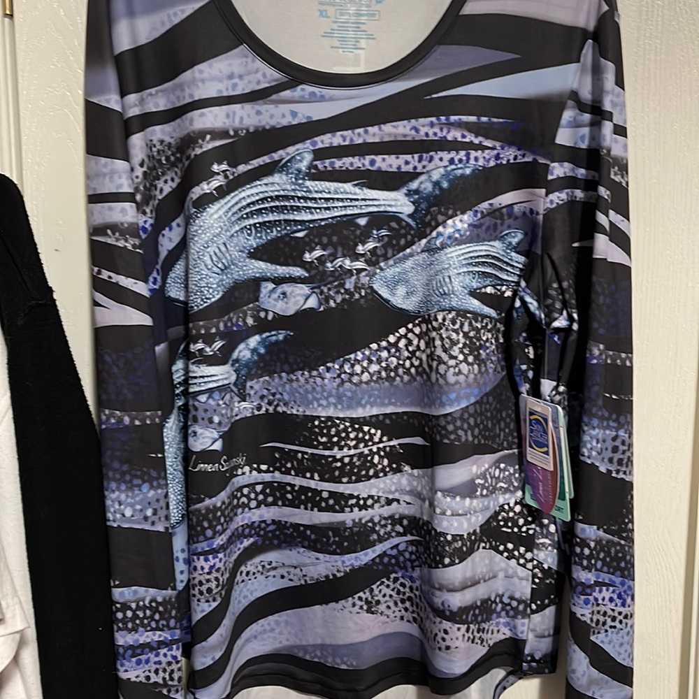 Brand new fishing shirt.  Reel legend